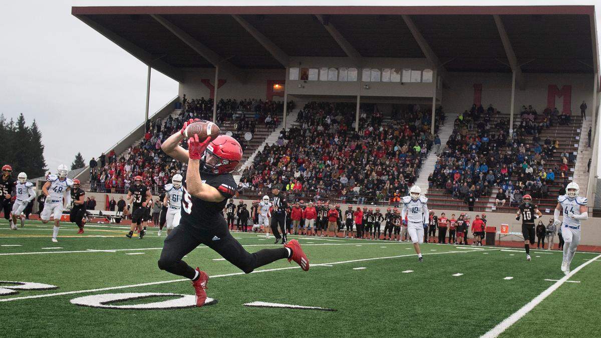 Yelm wide receiver Kyler Ronquillo lays out for a catch during Saturday afternoon’s 3A football state playoff game against the Seattle Prep Panthers at Yelm High School in Yelm, Washington, on Nov. 13, 2021. Yelm won the game, 52-28.