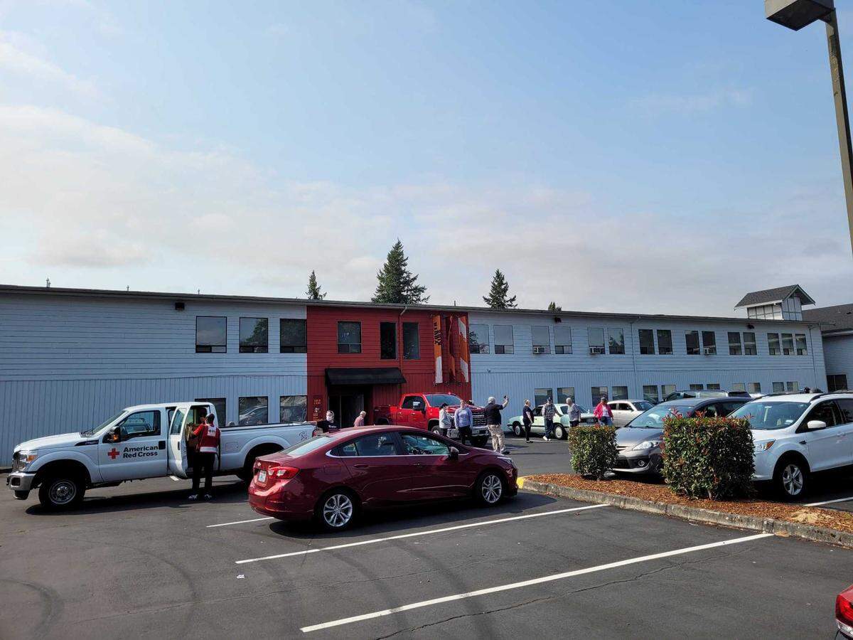 By 10 a.m. Saturday about 64 people had headed to the Puyallup Nazarene Church parking lot, which was set up as a shelter for families who had to evacuate a 1.1 mile radius of the city due to a large fire.