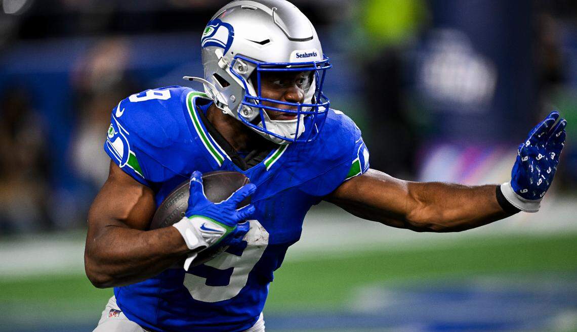 Seattle Seahawks running back Kenneth Walker III (9) carries the ball during the forth quarter of the game against the San Francisco 49ers at Lumen Field, on Thursday, Oct. 10, 2024, in Seattle, Wash.
