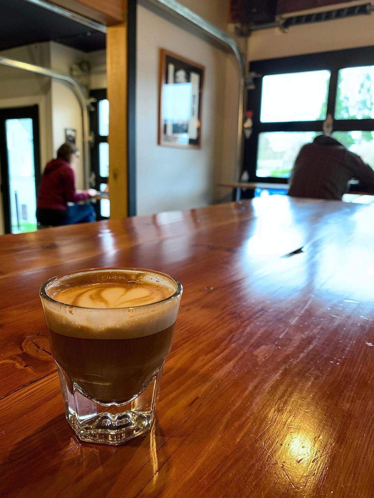 Manifesto Coffee roasts on-site on Tacoma’s Hilltop, selling wholesale to select shops around town. Get an espresso drink and a bag of beans for delicious cups at home.