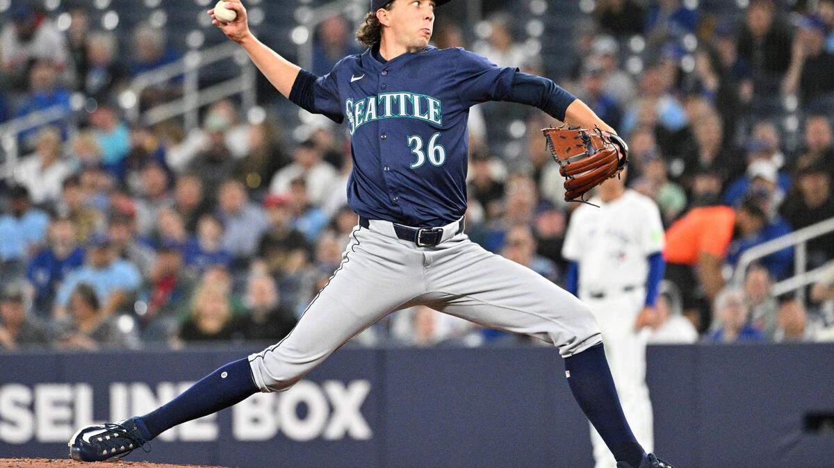 Apr 10, 2024; Toronto, Ontario, CAN;  Seattle Mariners starting pitcher Logan Gilbert (36) delivers a pitch against the Toronto Blue Jays in the first inning at Rogers Centre. Mandatory Credit: Dan Hamilton-USA TODAY Sports