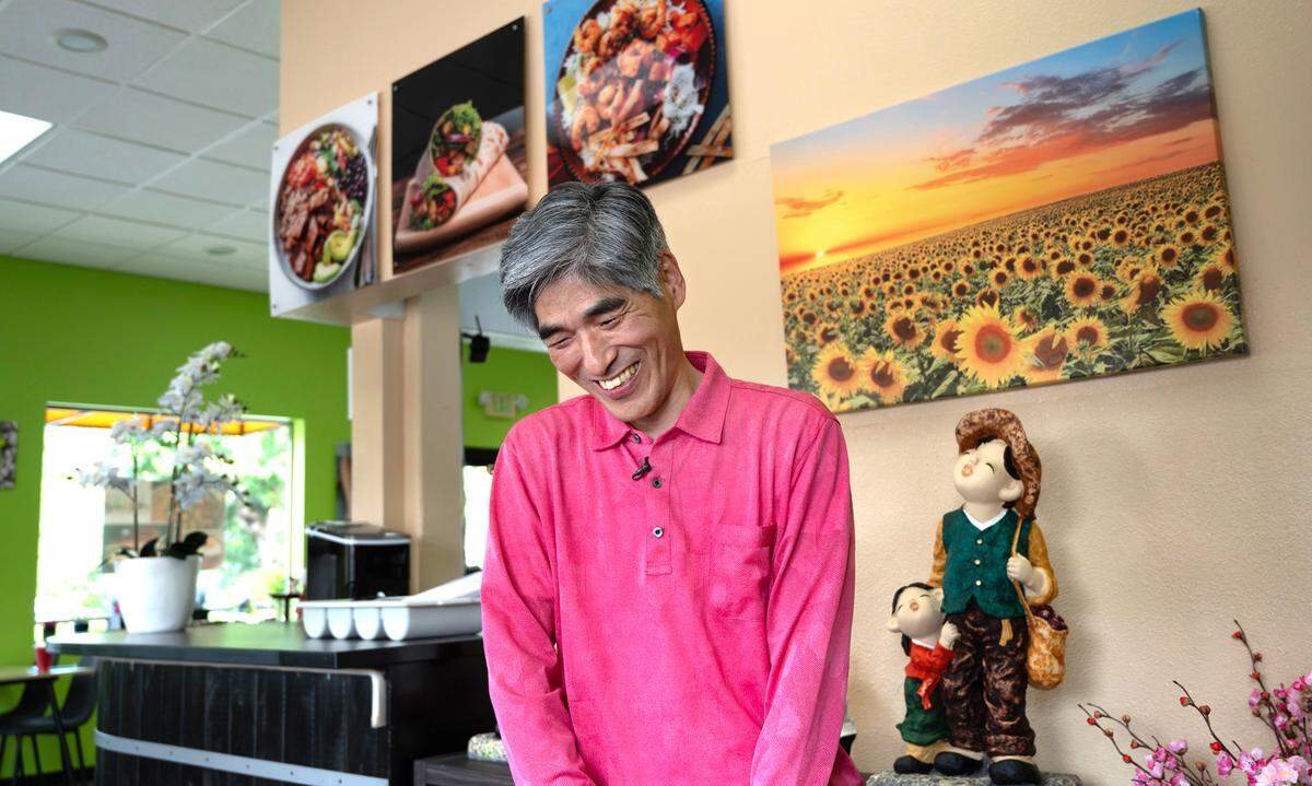 Sandy Jang in a moment of levity during his interview with The News Tribune in July. Without delivery, he said, his business won’t survive.