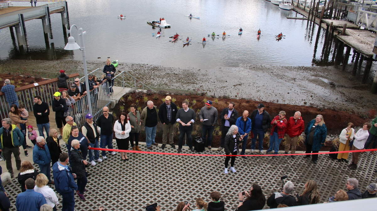 The ribbon-cutting ceremony at Ancich Park on Saturday, March 23, 2019. Various community members, including members of the Gig Harbor Canoe and Kayak Racing Team, were in attendance.