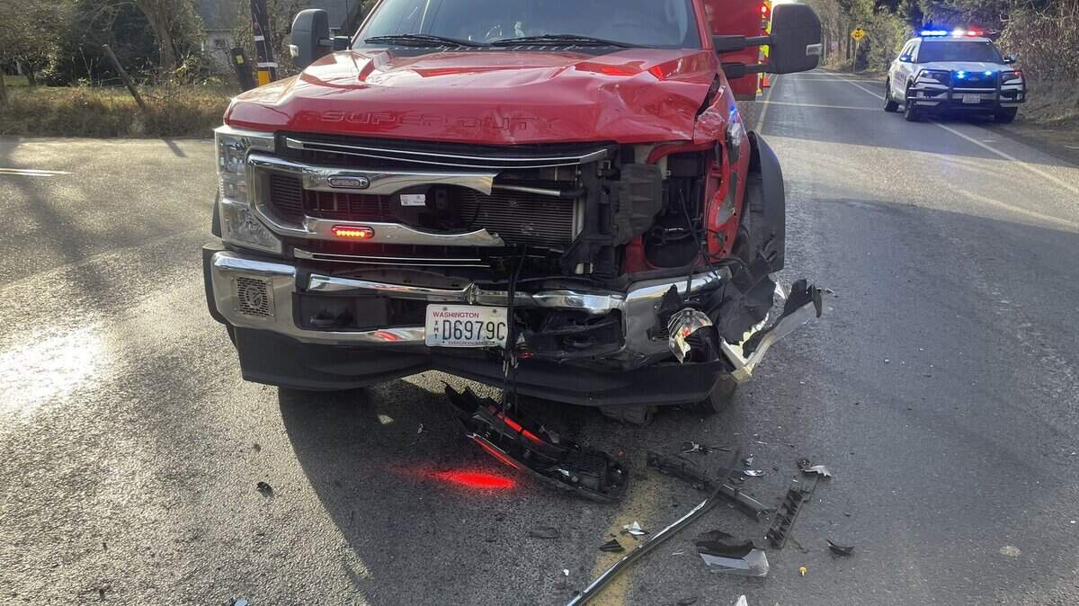 The front of a Graham Fire & Rescue transport unit took a hit in a collision with a passenger car in the 12600 block of 224th Street East in Graham on Wednesday, Jan. 22, 2025.