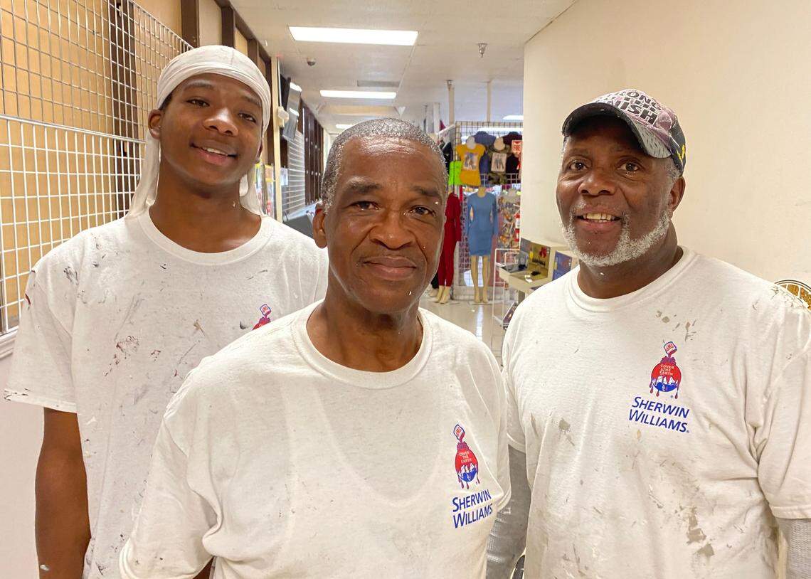 (From left) Charles Crittendon, Jasiha Christian and Kurt Carter have differing opinions on the importance of voting. The painters were on a lunch break in late September at the B & I Shopping Center in Lakewood.