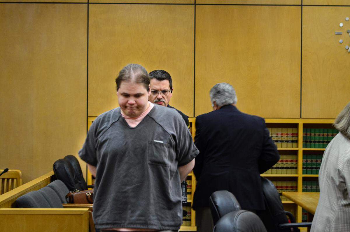 Spencer Kleine, 26, is led away following sentencing Friday, June 16, 2023 in Pierce County Superior Court. Judge Philip Sorensen sentenced him to 45 years in prison for his role in a four-person conspiracy to murder Ted Ralston and Joanna Gormly in May 2020.