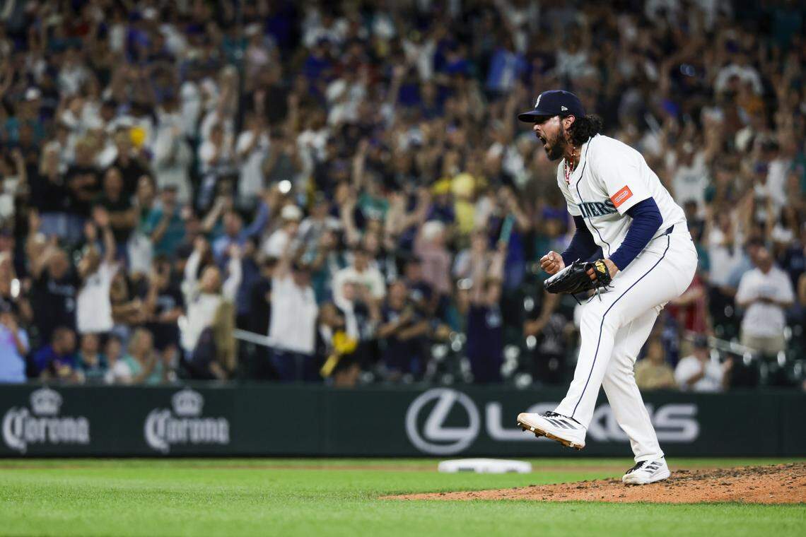 Aug 9, 2025; Seattle, Washington, USA; Seattle Mariners pitcher Andrés Muñoz (75) reacts following the final out of a victory against the Tampa Bay Rays at T-Mobile Park. Mandatory Credit: Joe Nicholson-Imagn Images