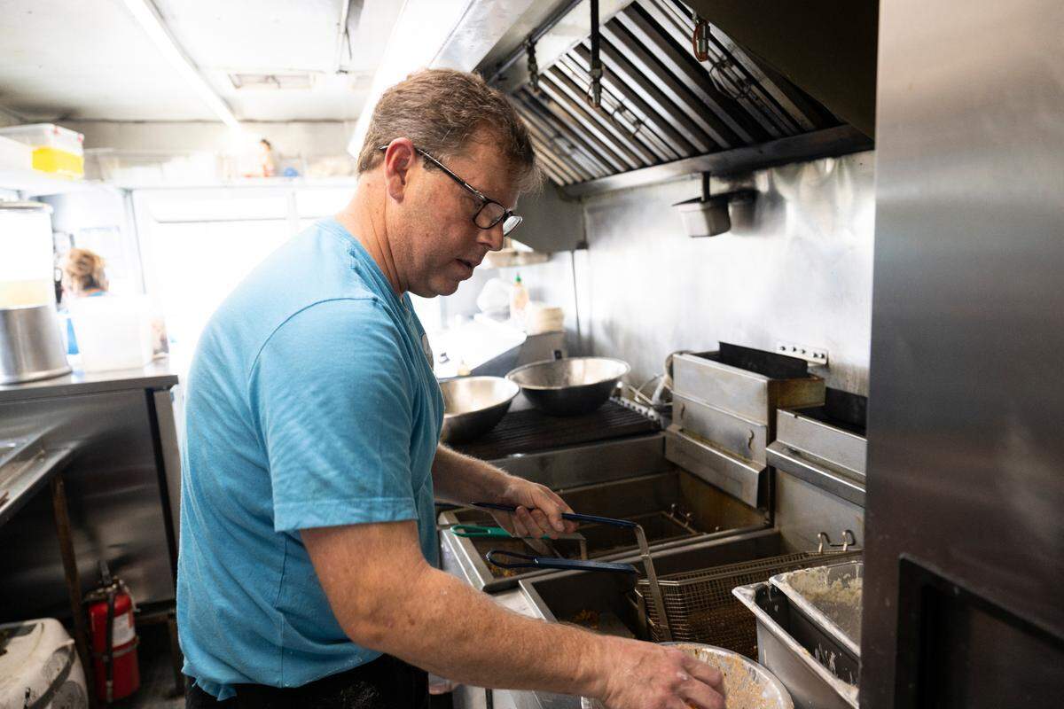 Trent Jurgensen is always behind the fryer, battering fish he picks up twice a week and fillets by hand.