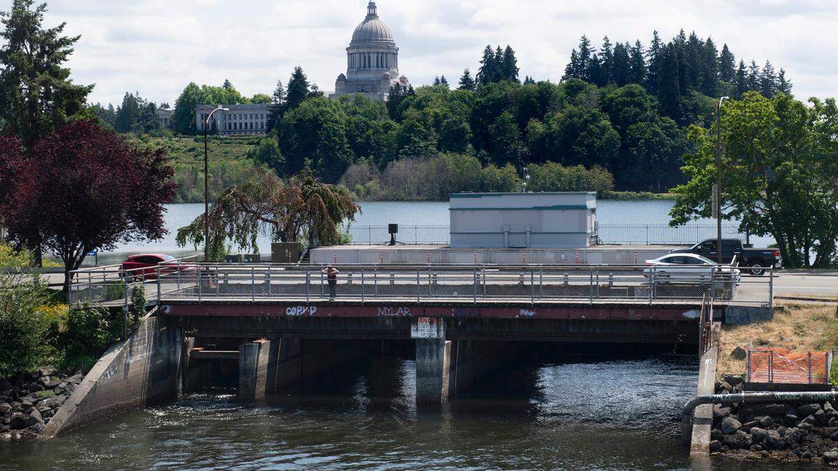 The dam and Fifth Avenue bridge at Capitol Lake in Olympia, Washington, on Friday, July 2, 2021. If the dam were removed, it would return the lake area to tide flats.