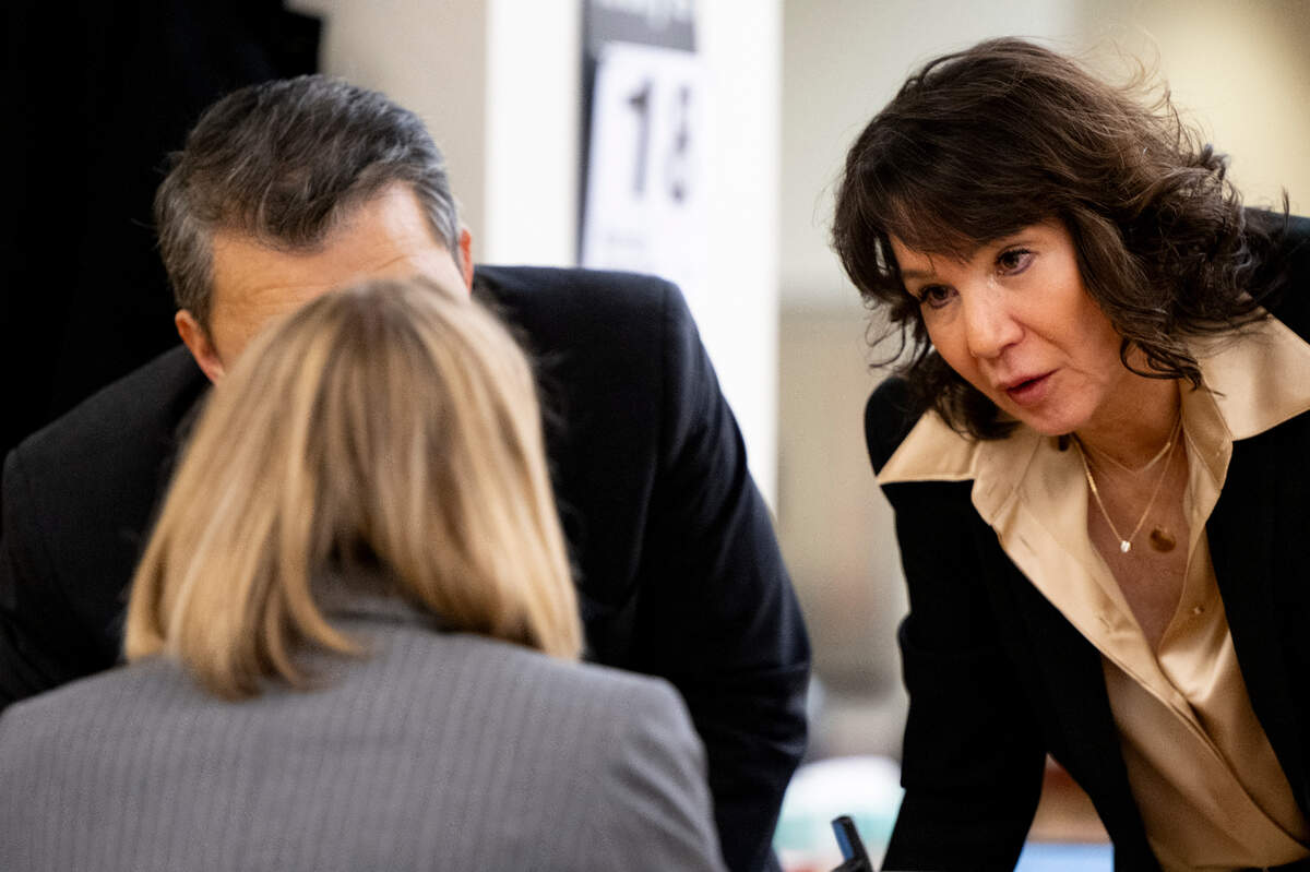 State assistant attorney general Kent Liu, special prosecutor Patty Eakes and Washington State assistant attorney Lori Nicolavo confer with one another as jury issues arise during deliberation in the trial of three Tacoma police officers.