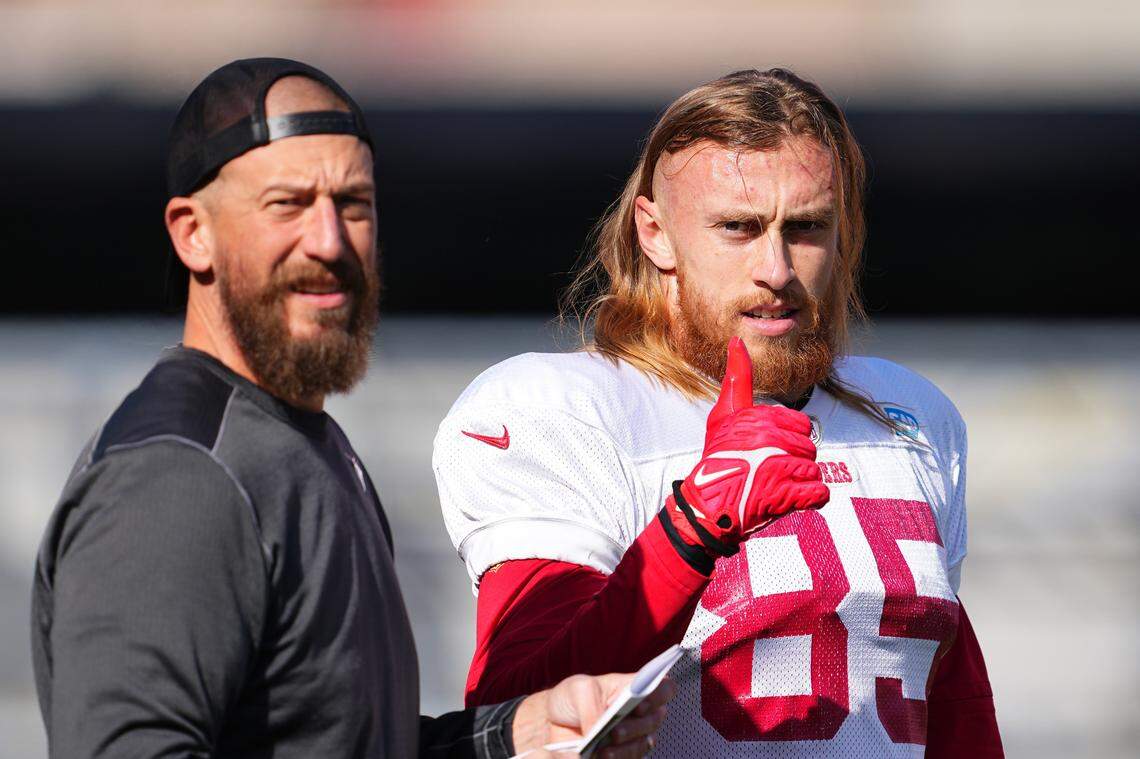 LAS VEGAS, NEVADA - FEBRUARY 08: George Kittle #85 and tight ends coach Brian Fleury during San Francisco 49ers practice ahead of Super Bowl LVIII at Fertitta Football Complex on February 08, 2024 in Las Vegas, Nevada. (Photo by Chris Unger/Getty Images)