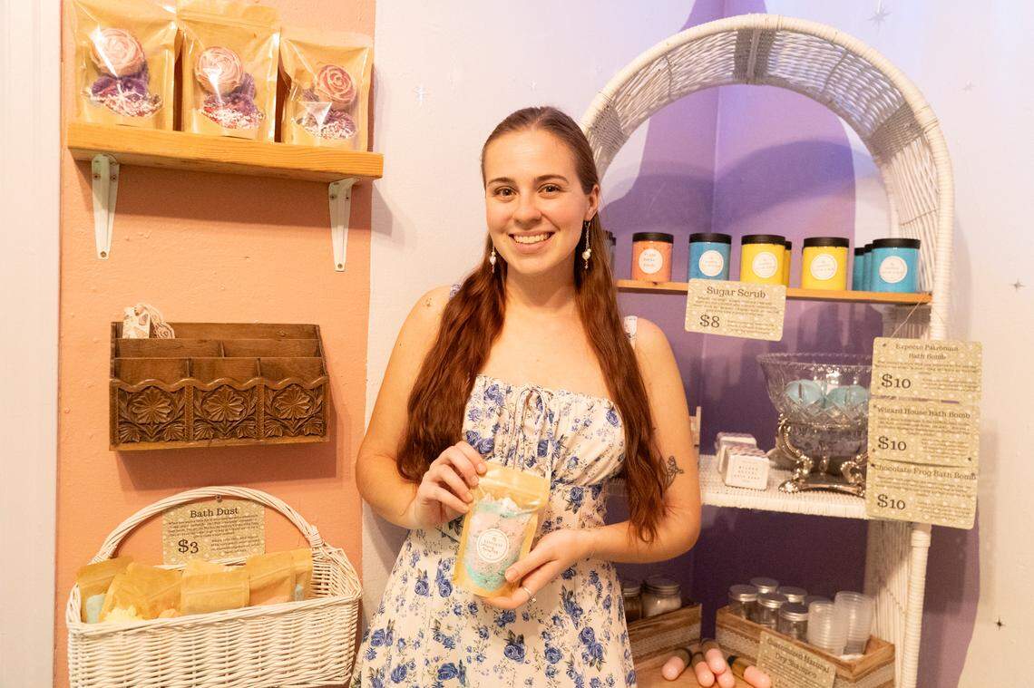 Erin Gallagher, owner of The Lazy Lily, holds her bath dust, which is basically a deconstructed bath bomb.