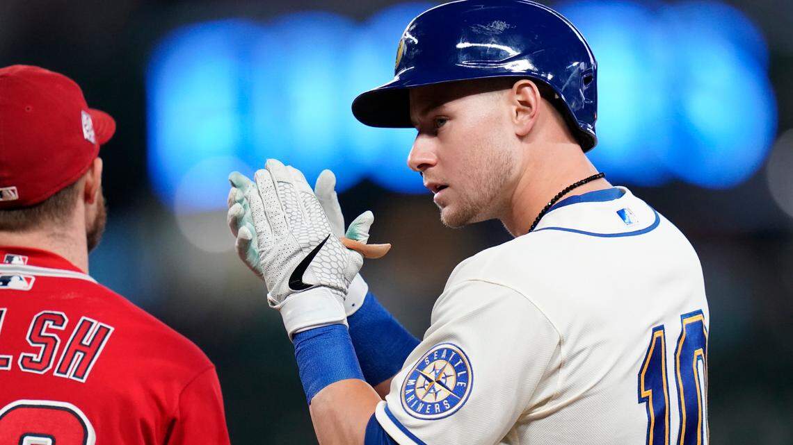 Seattle Mariners’ Jarred Kelenic stands on first after hitting a single against the Los Angeles Angels in a baseball game Sunday, Oct. 3, 2021, in Seattle. (AP Photo/Elaine Thompson)