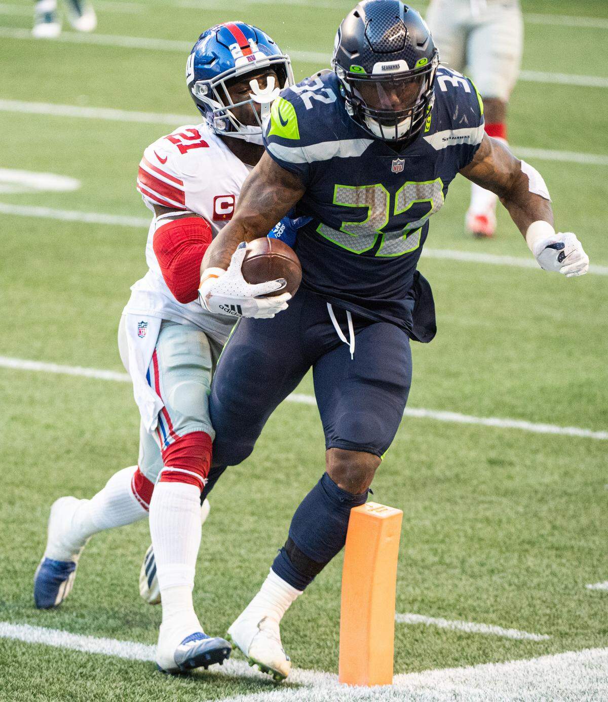 Seattle Seahawks running back Chris Carson scores a touchdown during the fourth quarter. The Seattle Seahawks played the New York Giants in a NFL football game at Lumen Field in Seattle, Wash., on Sunday, Dec. 6, 2020.