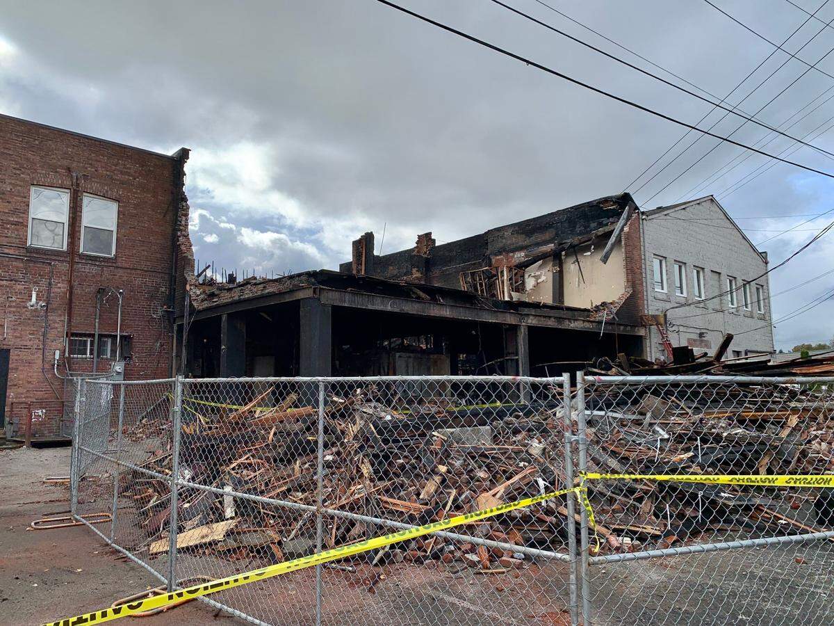 The back of what remains of 1003-1005 Main St. in Sumner, following the Oct. 28 three-alarm fire, shown here on Wednesday, Nov. 2, 2022 after crews had knocked down unsafe parts of the 111-year-old building.