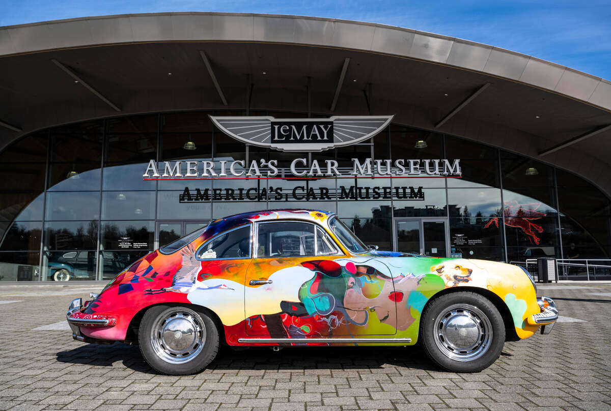 A 1965 Porsche 356 owned by Rick and Sally Danielson of Graham is parked in front of the Lemay — America’s Car Museum in Tacoma on March 14, 2023. The Danielson’s had the car custom painted by artist, Zak Barnes, from Kansas to commemorate memories they’ve made together traveling the United States. The couple also loaned a 1956 Porsche 356 A Rally to the museum for its new exhibition, “Porsche at 75.”