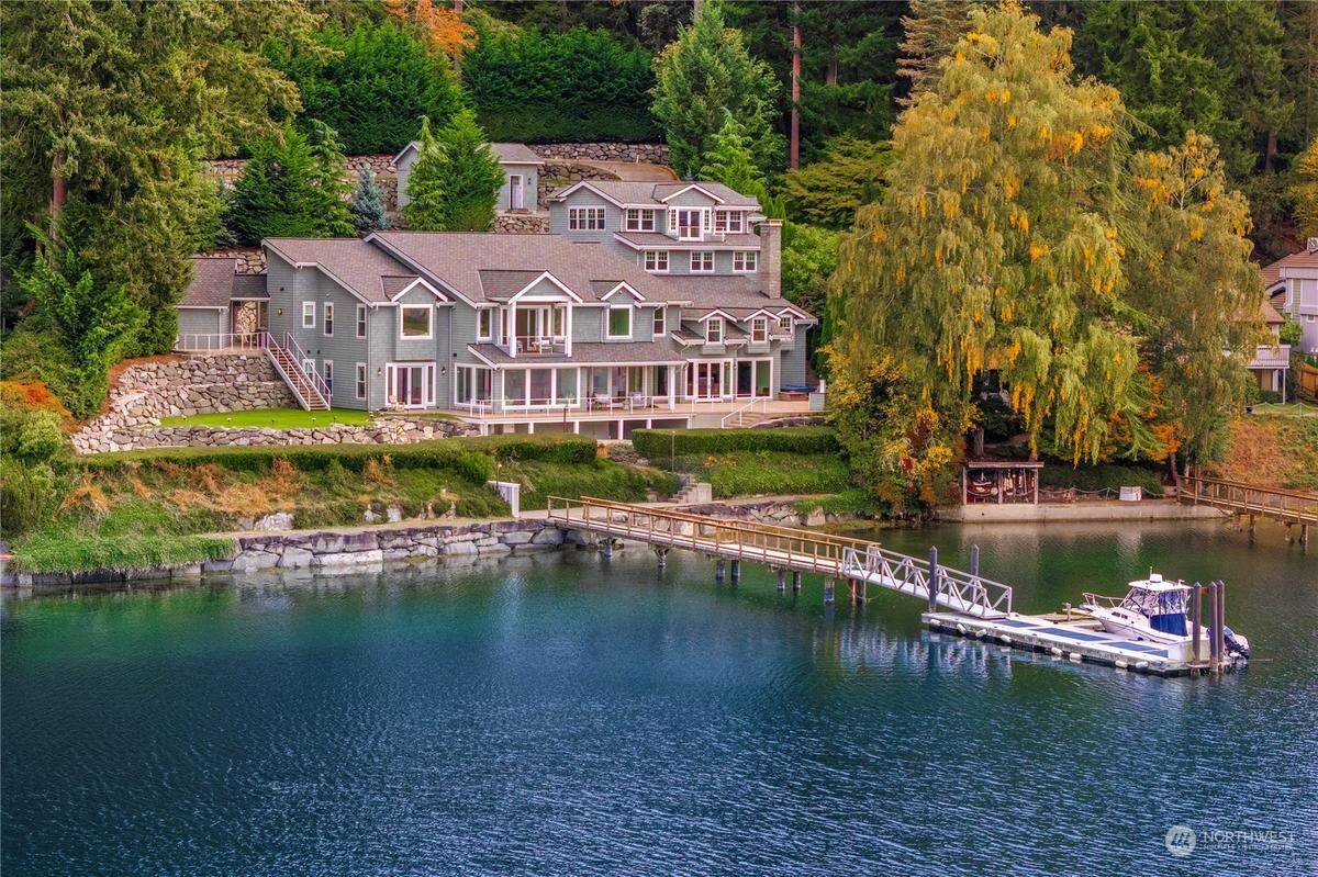 A home at 7906 Goodman Dr. NW overlooking the Gig Harbor waterfront is for sale at $12.8 million. The home has been on the market for just over a year, according to the listing broker.