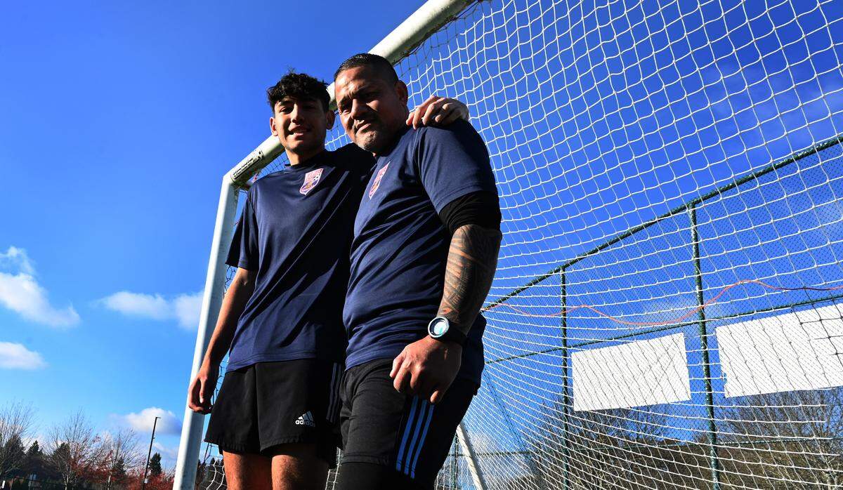 Taking some impromptu goal tending practice with his son Dylan at the Regional Athletic Complex in Lacey, Wa. on Nov.16 Nicky Salapu is an American Samoan soccer goalkeeper who was on the world’s worst international team when they claimed their first ever victory in a FIFA-recognized match against Tonga. His story is documented in the comedic film “Next Goal Wins” which comes out Nov. 17. The film has some big Hollywood stars attached to it as he’s portrayed in the by actor Uli Latukefu