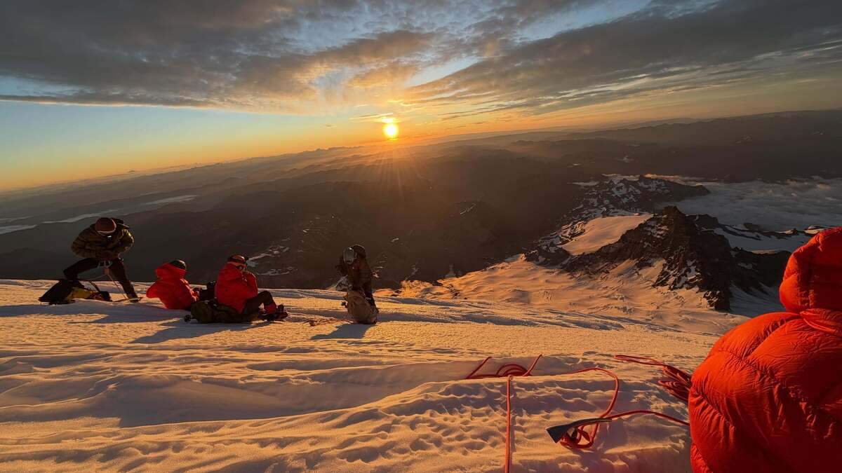 A photo from Mike King’s 99th summit. Sunrise on “The Mountain.”