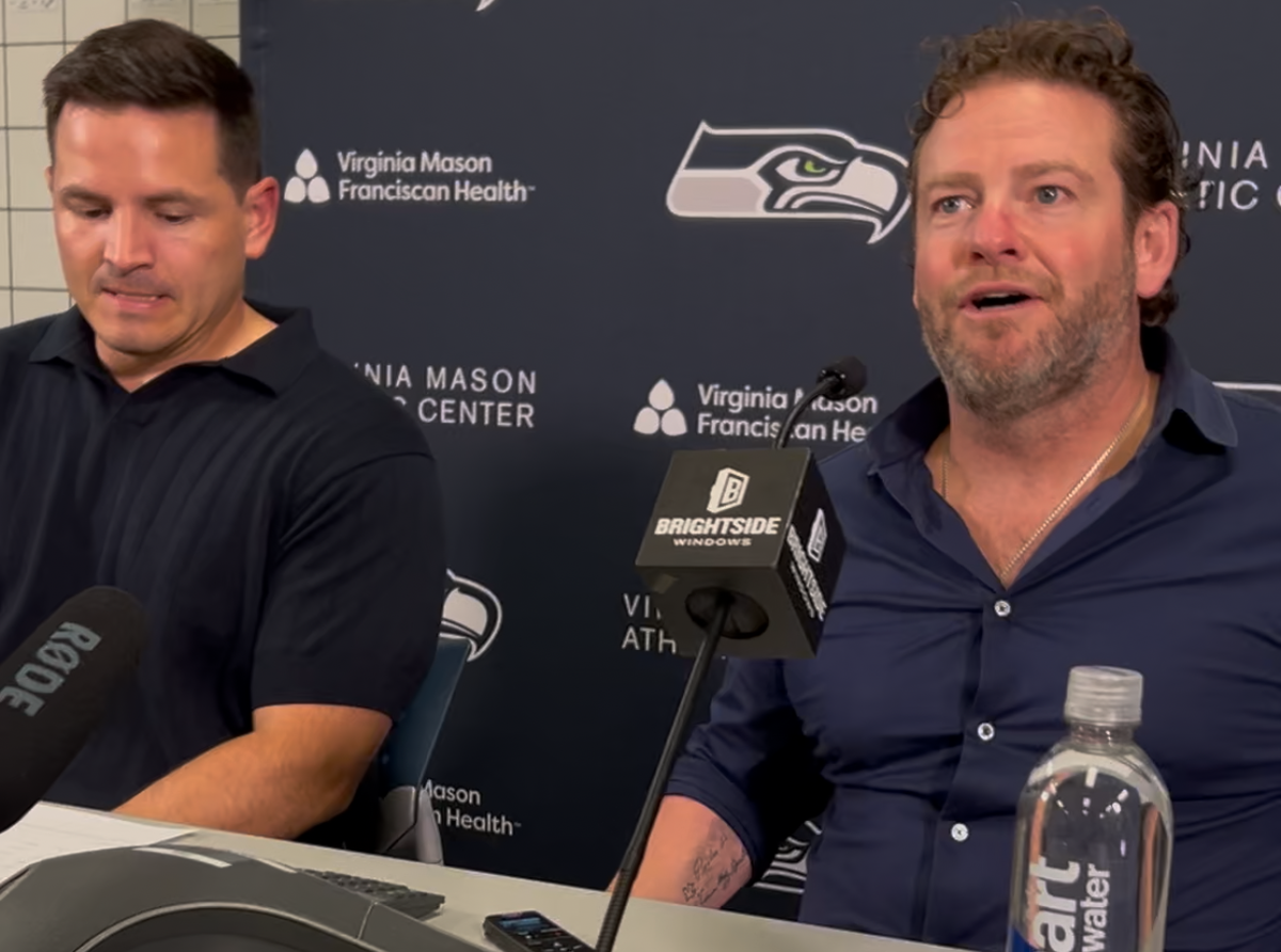 General manager John Schneider (right) with a look of almost wonder as he begins to discuss the second day of the Seahawks’ NFL draft April 25, 2025, at the Virginia Mason Athletic Center in Renton.