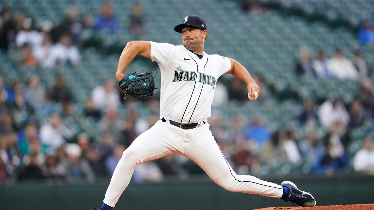 Seattle Mariners starting pitcher Robbie Ray throws to a Texas Rangers batter during the first inning of a baseball game Tuesday, April 19, 2022, in Seattle. (AP Photo/Ted S. Warren)