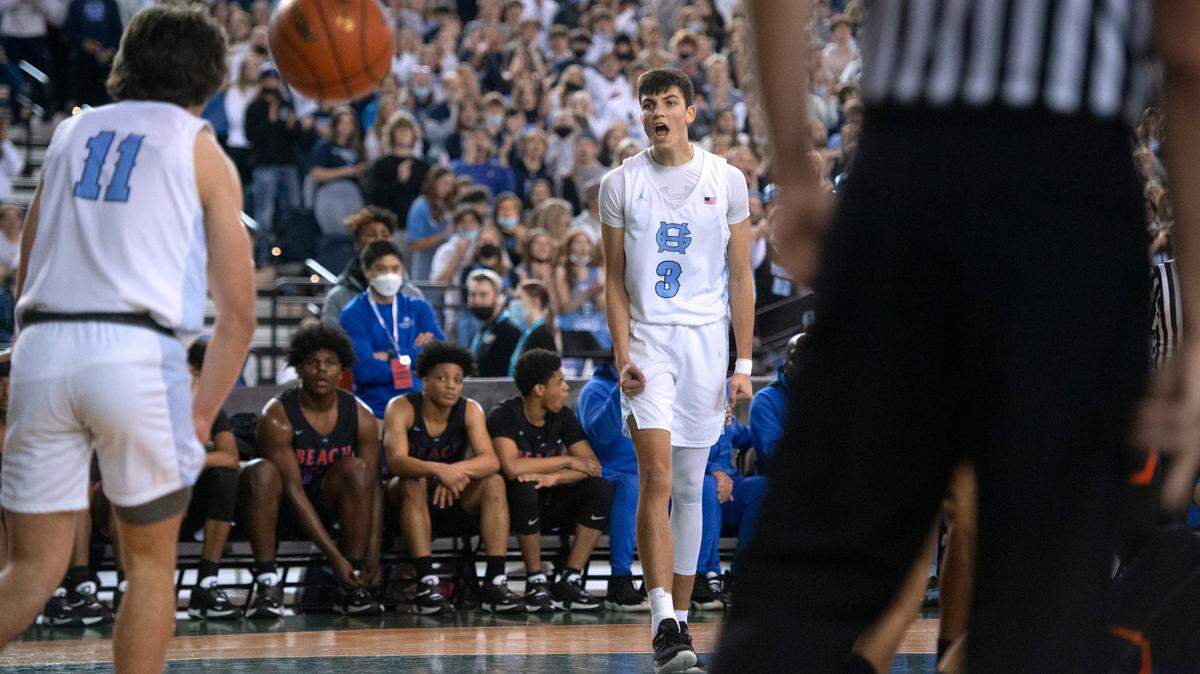 Gig Harbor’s Will Landram lets out a yell to teammate Christian Parrish after drawing a foul against the Rainier Beach Vikings during Thursday afternoon’s quarterfinal game of the WIAA 3A Boys Basketball State Championships tournament in the Tacoma Dome in Tacoma, Washington, on Thursday, March 3, 2022. Rainier Beach won the game, 65-60.