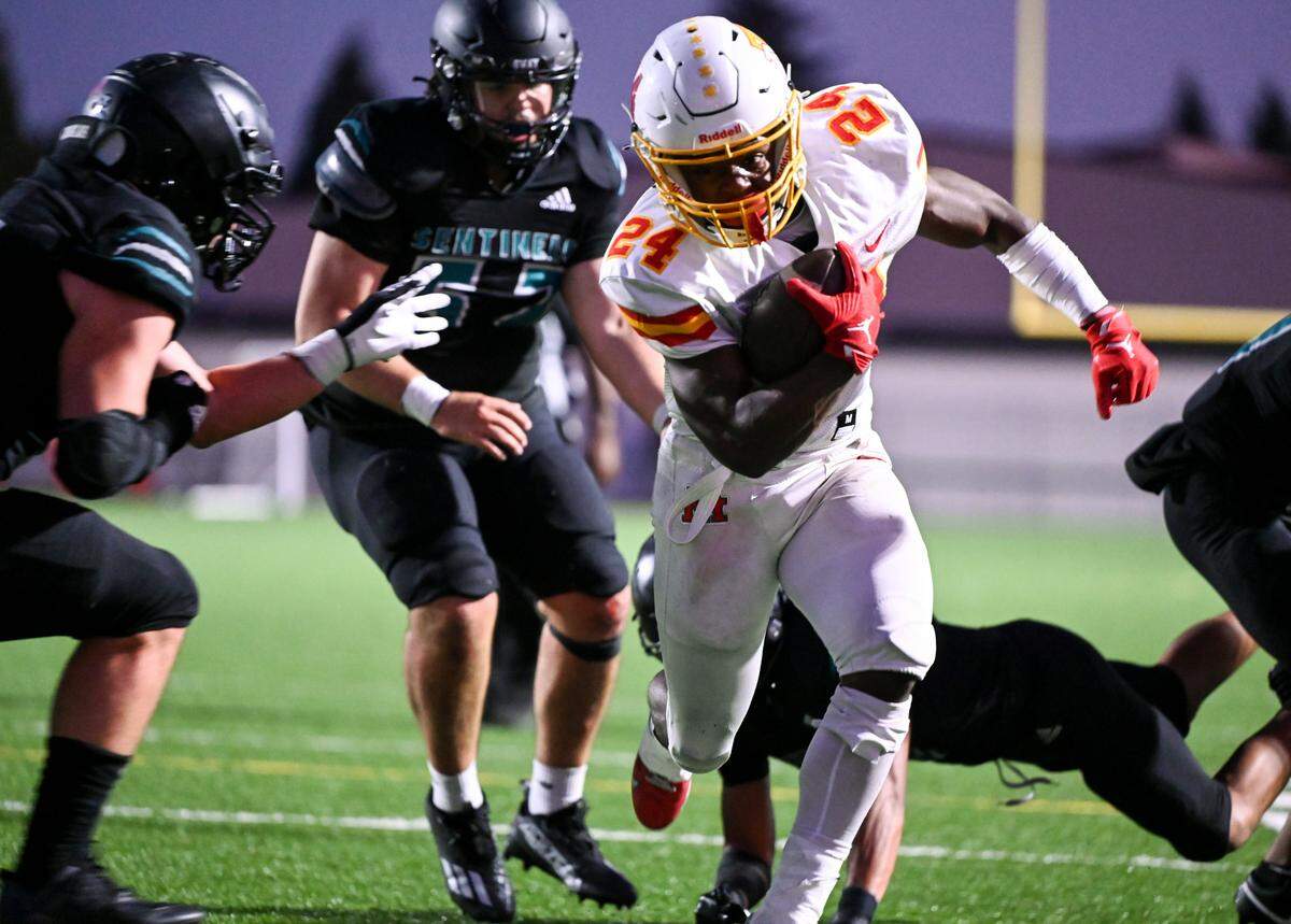 Mount Tahoma’s Brison Bailey (24) runs in a touchdown against the Spanaway Lake during the first half at Albert Crate Field, Thursday, Sept. 14, 2023, Spanaway, Wash.