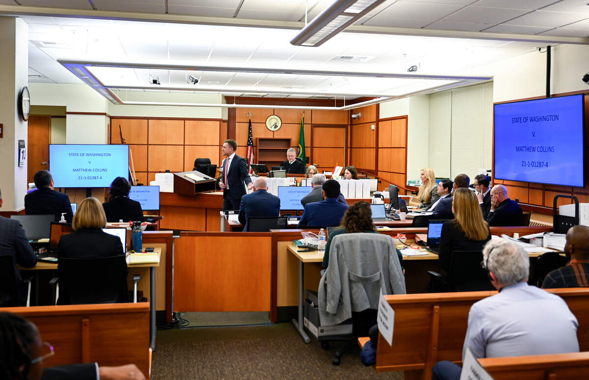 Defense attorney Casey Arbenz gives opening statements on behalf of defendant Matthew Collins during the trial of three Tacoma Police officers in the killing of Manny Ellis at Pierce County Superior Court, Monday, Nov. 13, 2023, in Tacoma, Wash.Tacoma Police Officers Christopher Burbank, Matthew Collins and Timothy Rankine stand trial for charges related to the March 2020 killing of Manny Ellis. (Brian Hayes / Pool Photo – The News Tribune)