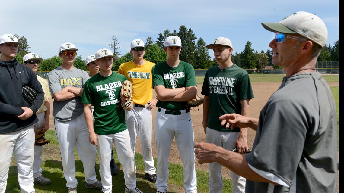 Blazers’ head baseball coach Mark Rubadue lines out the May 13th practice regimen to his players as they prepare for the state playoffs this weekend in Yakima.