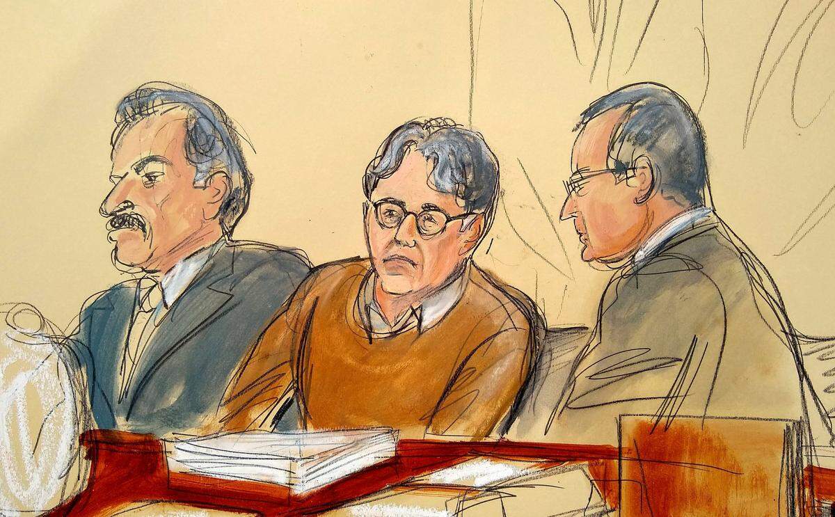 In this May 7, 2019, courtroom drawing, defendant Keith Raniere, center, leader of the secretive group NXIVM, is seated between his attorneys Paul DerOhannesian, left, and Marc Agnifilo during the first day of his sex trafficking trial. Raniere was a self-improvement guru whose organization NXIVM attracted millionaires and actresses among its adherents.