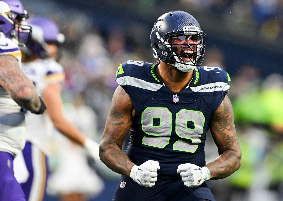 Seattle Seahawks defensive end Leonard Williams (99) reacts to a false start from the Minnesota Vikings during the fourth quarter of the game at Lumen Field, on Sunday, Dec. 22, 2024, in Seattle, Wash.