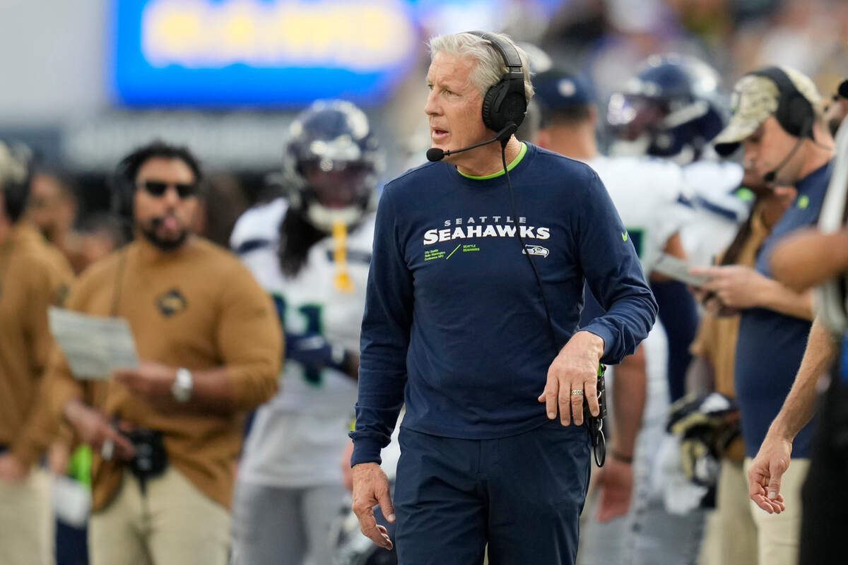 Seattle Seahawks head coach Pete Carroll looks on from the sideline during the first half of an NFL football game against the Los Angeles Rams Sunday, Nov. 19, 2023, in Inglewood, Calif. (AP Photo/Ashley Landis)