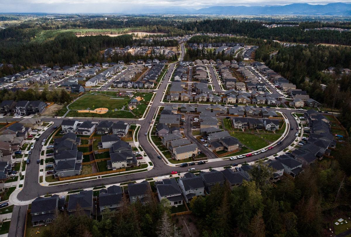 Houses and parks are seen in the Tehaleh development in Bonney Lake on Sept. 22. Tehaleh will continue to grow by 300-350 homes per year through a mix of national and regional builders, said Newland Communities vice president Scott Jones. Already, 320 homes have been sold this year.
