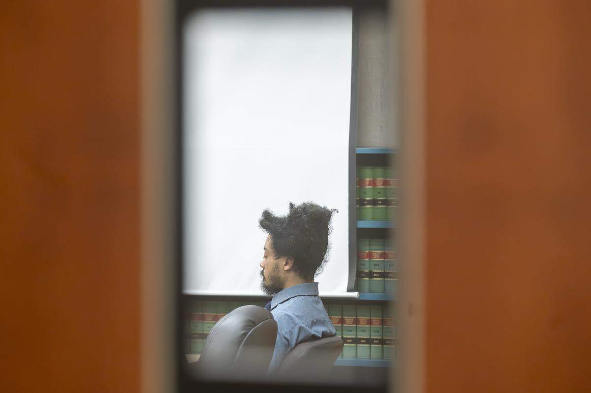Nicholas Fitzgerald Matthew, 29, sits still in his seat as his trial begins on Tuesday, Aug. 5, 2025, at Pierce County Superior Court in Tacoma, Wash., for the brutal stabbing attack of a woman walking on a trail of Point Defiance Park on February 2024. Matthew is accused of first-degree attempted murder.