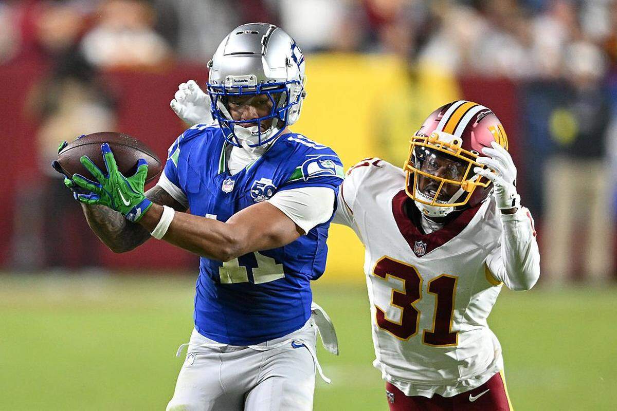 Seattle Seahawks wide receiver Jaxon Smith-Njigba (11) catches a pass against Washington Commanders cornerback Jonathan Jones (31) during the second quarter in the game at Northwest Stadium on November 02, 2025 in Landover, Maryland. (Photo by Greg Fiume/Getty Images)