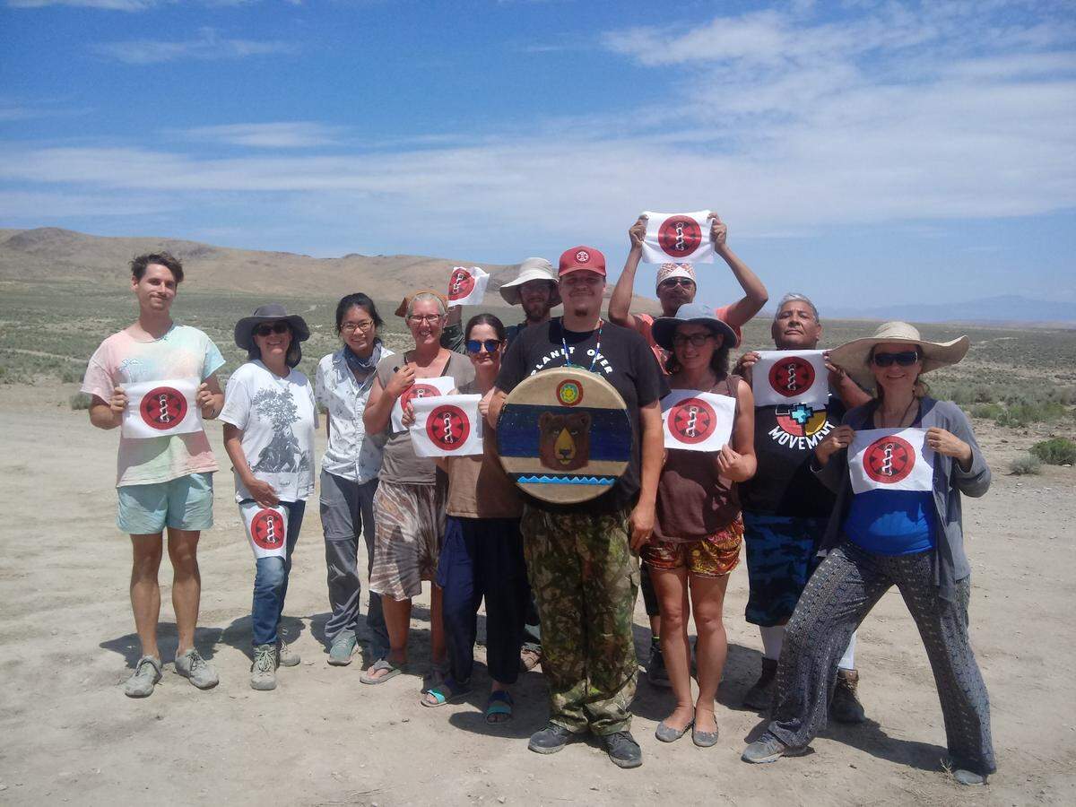 Washington State University student Greg Urquhart, center, with his group South Sound Street Medics at a demonstration in Thacker Pass, Nevada. The group was providing first aid services to demonstrators protesting a lithium mine in the area. Urquhart founded the group after accidentally becoming involved, providing first aid to water protectors tear gassed at the Dakota Access Pipeline protests in 2016.