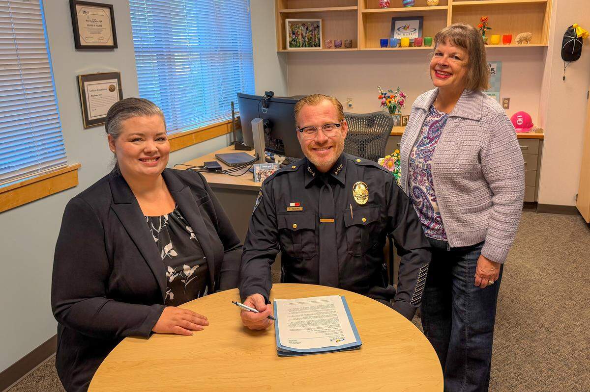 (left to right) Gig Harbor City Administrator Katrina Knutson, Police Chief Tray Federici, Mayor Mary Barber.