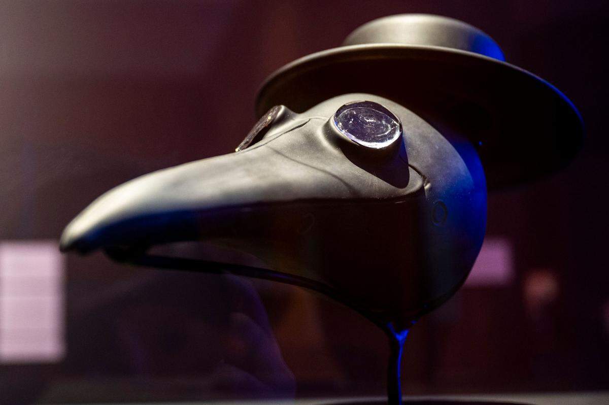 Edgar Valentine’s “Doctor’s Mask and Hat,” is seen at “GATHER: 27 Years of Hilltop Artists” at the Tacoma Art Museum on Tuesday, March 29, 2022, in Tacoma, Wash. Valentine is an alumni of the Hilltop Artists Program and a participant on the Netflix reality series “Blown Away,” a series about glass-blowing artists.