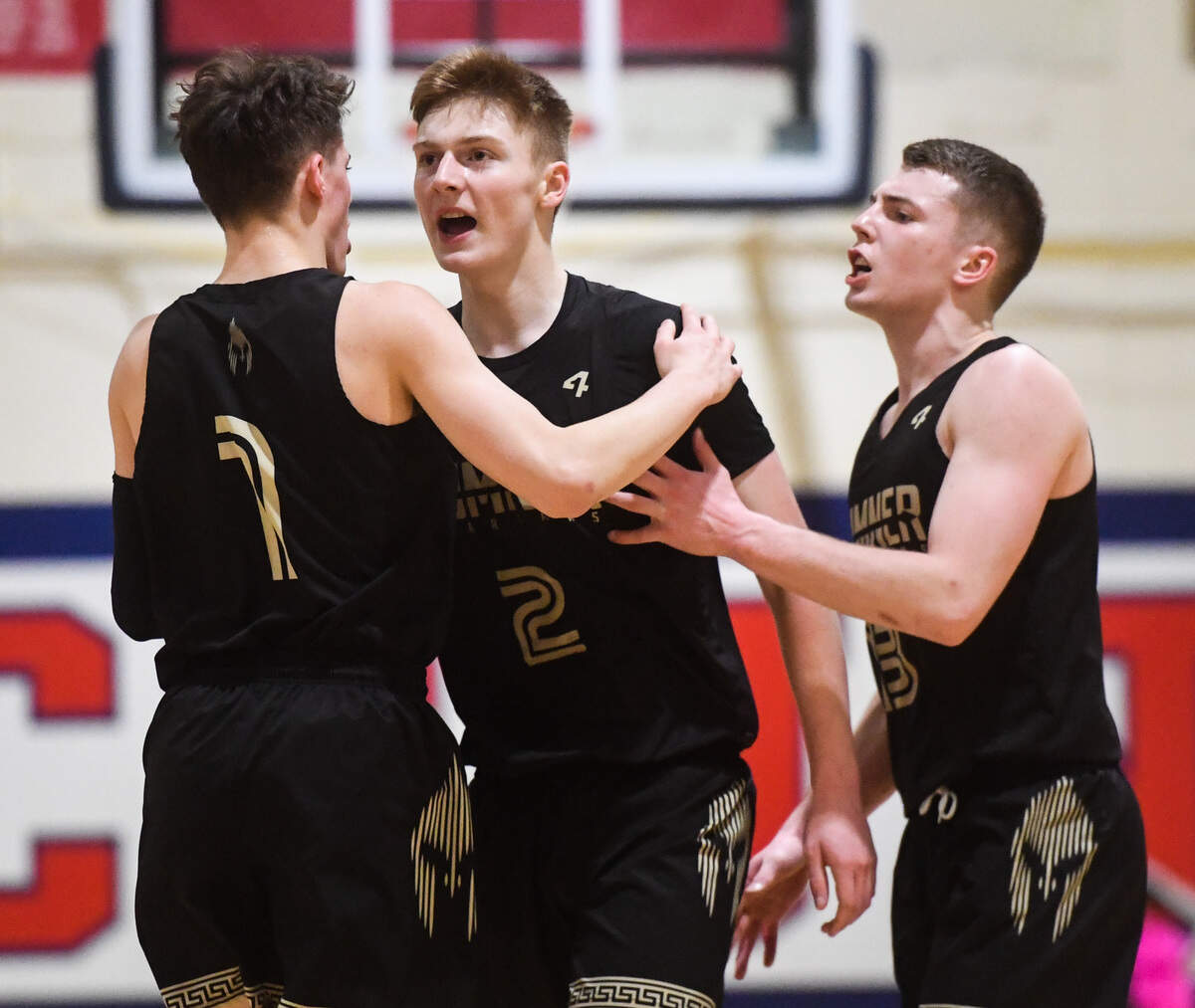 Sumner’s Champ Spencer celebrates a buzzer beater during the second quarter. Sumner played Auburn in a basketball game at Wilson High School in Tacoma, Wash., on Friday, Feb. 14, 2020.