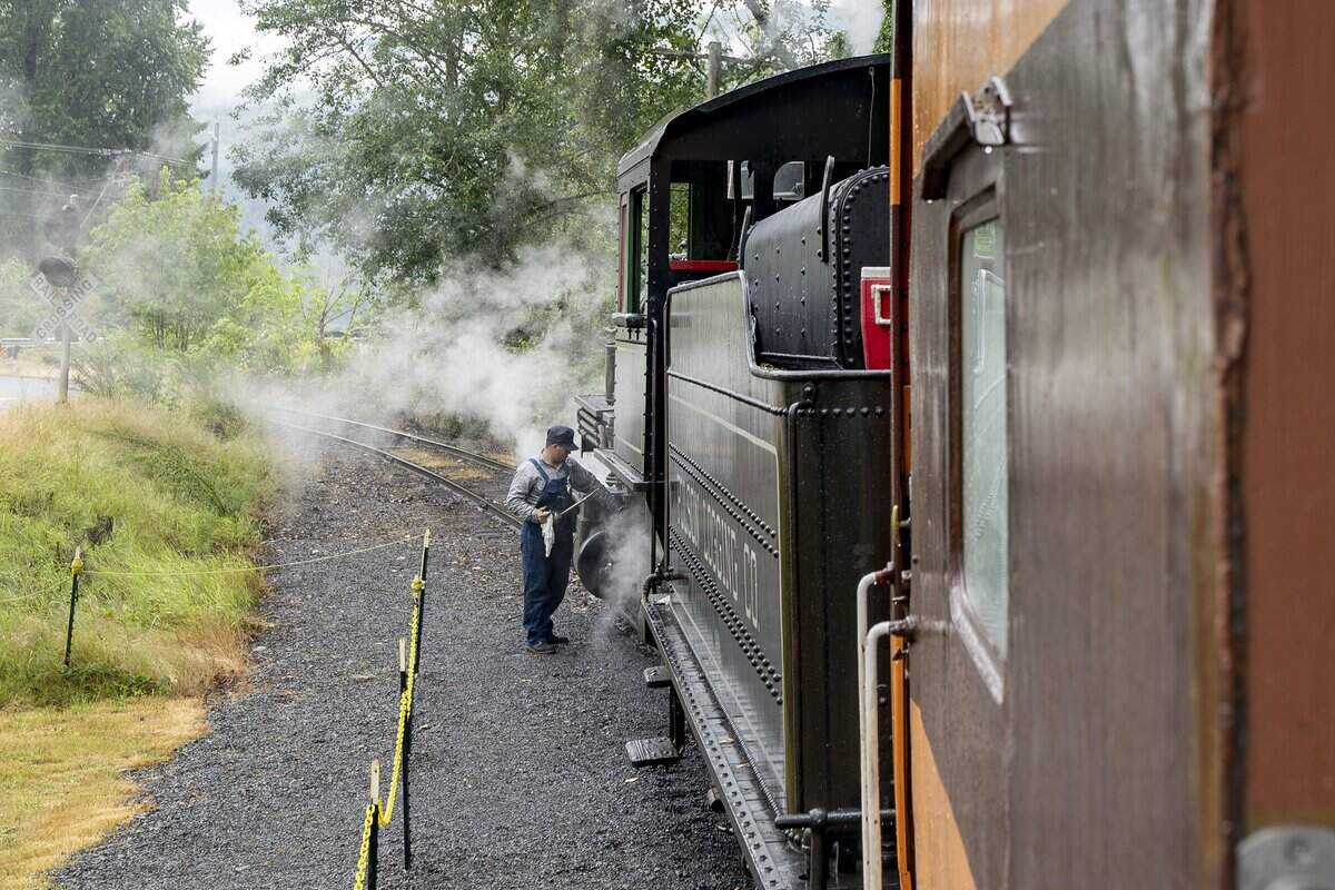 The Mt. Rainier Scenic Railroad steam engine, the Polson No. 70, is prepped for a journey on Thursday, July 16, 2026, in Elbe, Wash.