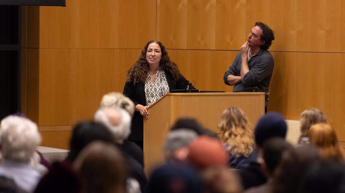 University of Puget Sound philosophy professors Ariela Tubert and Justin Tiehen speak at their lecture on Nov. 13, 2025, titled “Dating a Zombie: AI Romantic Companions and the Question of Consciousness.”