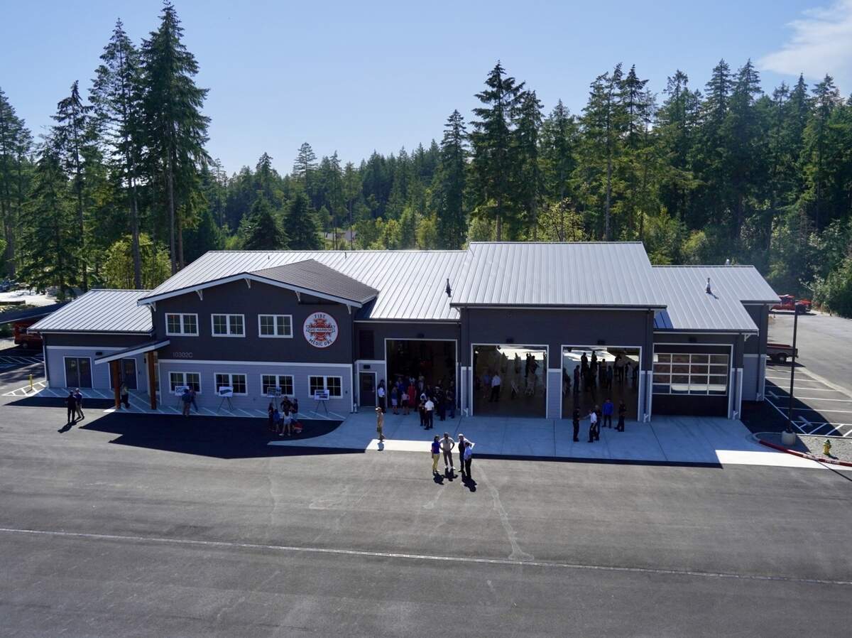 Attendees mill around the new support building at Gig Harbor Fire & Medic One’s training campus during the grand opening Wednesday, June 24, 2026, near Gig Harbor, Wash. The two-story building is 11,866 square feet and includes offices, meeting space and classrooms, as well as an apparatus bay.