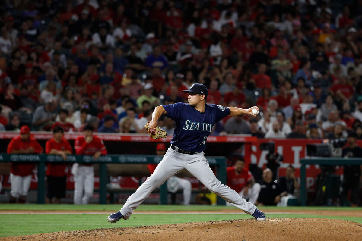 Seattle Mariners starting pitcher Marco Gonzales throws to a Los Angeles Angels batter during the fifth inning of a baseball game Wednesday, July 11, 2018, in Anaheim, Calif. (AP Photo/Jae C. Hong)