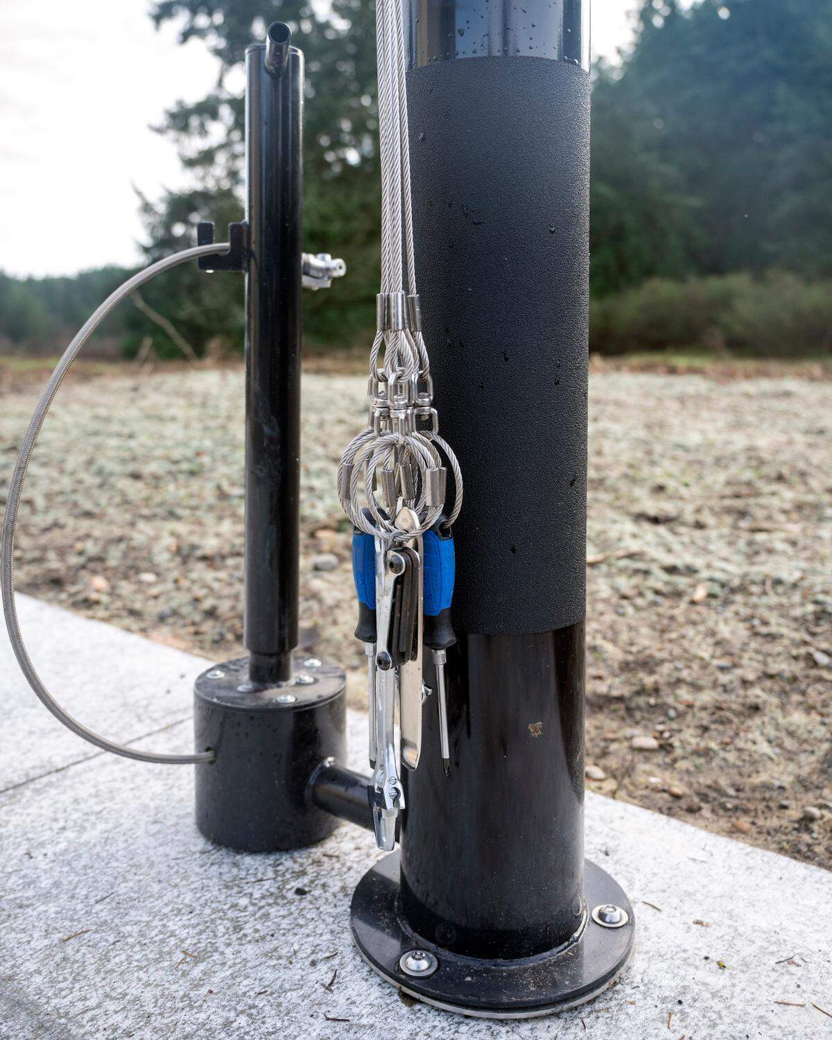 A bike repair station sits along the main paved walkway at Swan Lake Park on Friday in Tacoma.