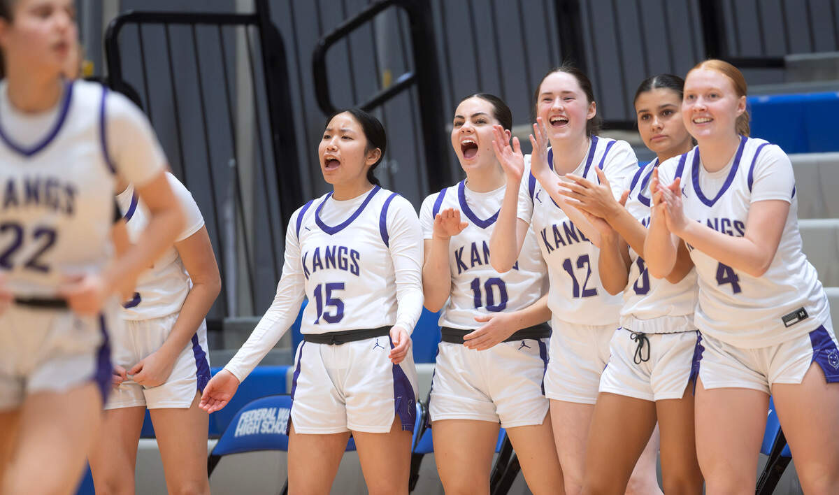 The Lake Washington bench celebrates a three-point basket by Ileana Olteanu (22) during the Kangaroos’ 58-47 win over the Sumner Spartans in “The Dream Showcase” MLK basketball tournament at Federal Way High School in Federal Way, Washington, on Monday, Jan. 20, 2025.
