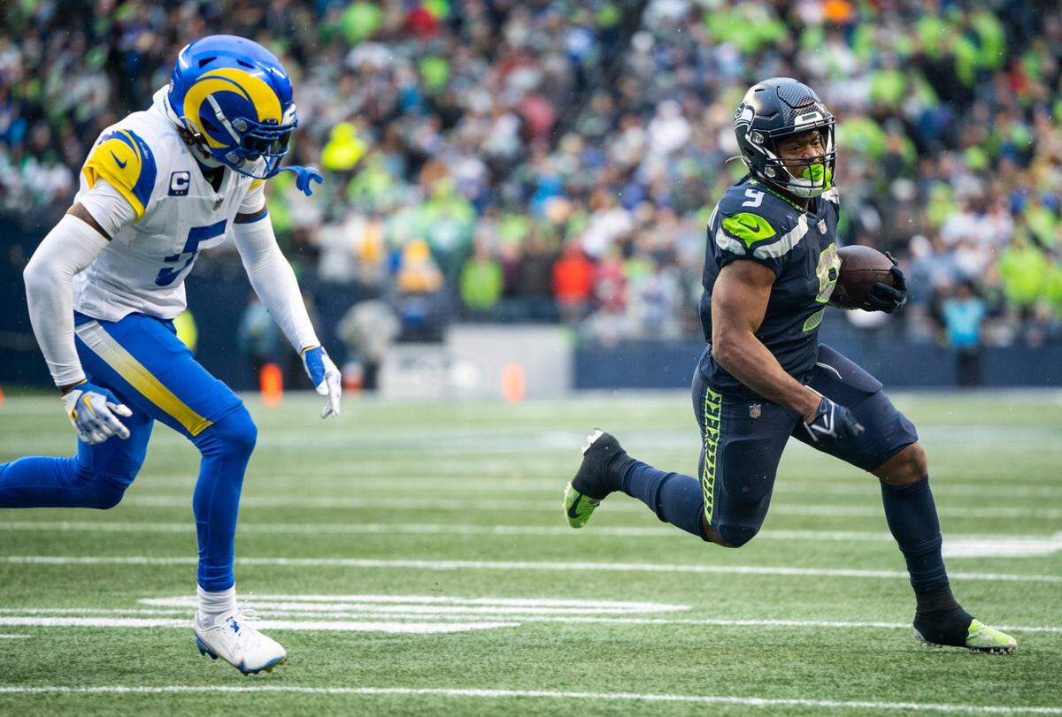 Seattle Seahawks running back Kenneth Walker III (9) runs down the field with the ball in the fourth quarter of an NFL game against the Los Angeles Rams at Lumen Field in Seattle, Wash. on Jan. 8, 2023. The Seahawks defeated the Rams in overtime 19-16.