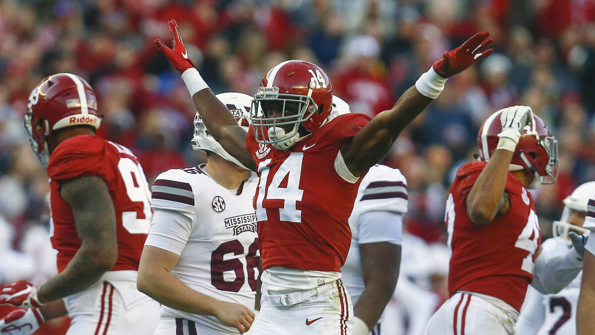 FILE - In this Nov. 10, 2018, file photo, Alabama defensive back Deionte Thompson (14) celebrates after Mississippi State place kicker Jace Christmann (47) missed a field goal-attempt during the first half of a game, in Tuscaloosa, Ala. Thompson was named to the 2018 AP All-America NCAA college football team, Monday, Dec. 10, 2018. (AP Photo/Butch Dill, File)