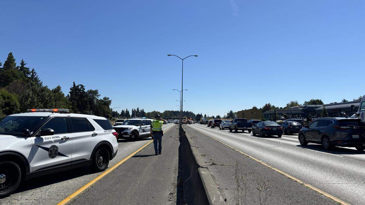State Patrol is one scene for a crash between a car and motorcycle on I-5 in Tacoma on August 21, 2025.