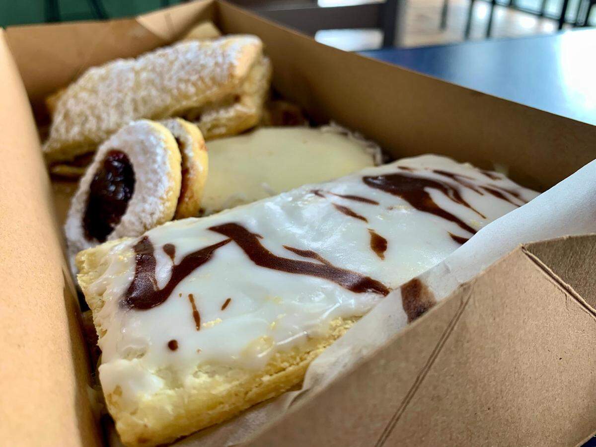 Old Times Bakery has relocated from its original Pacific Avenue and 34th Street location to University Place, serving the same humble pastries as well as pizza and espresso.