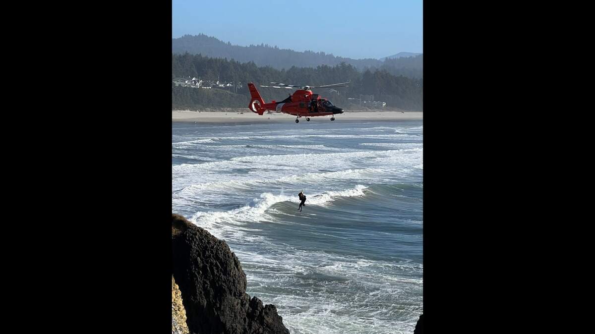 Three surfers were saved from rocks during a rough surf on Feb. 12, 2023, near Agate Beach in Oregon.
